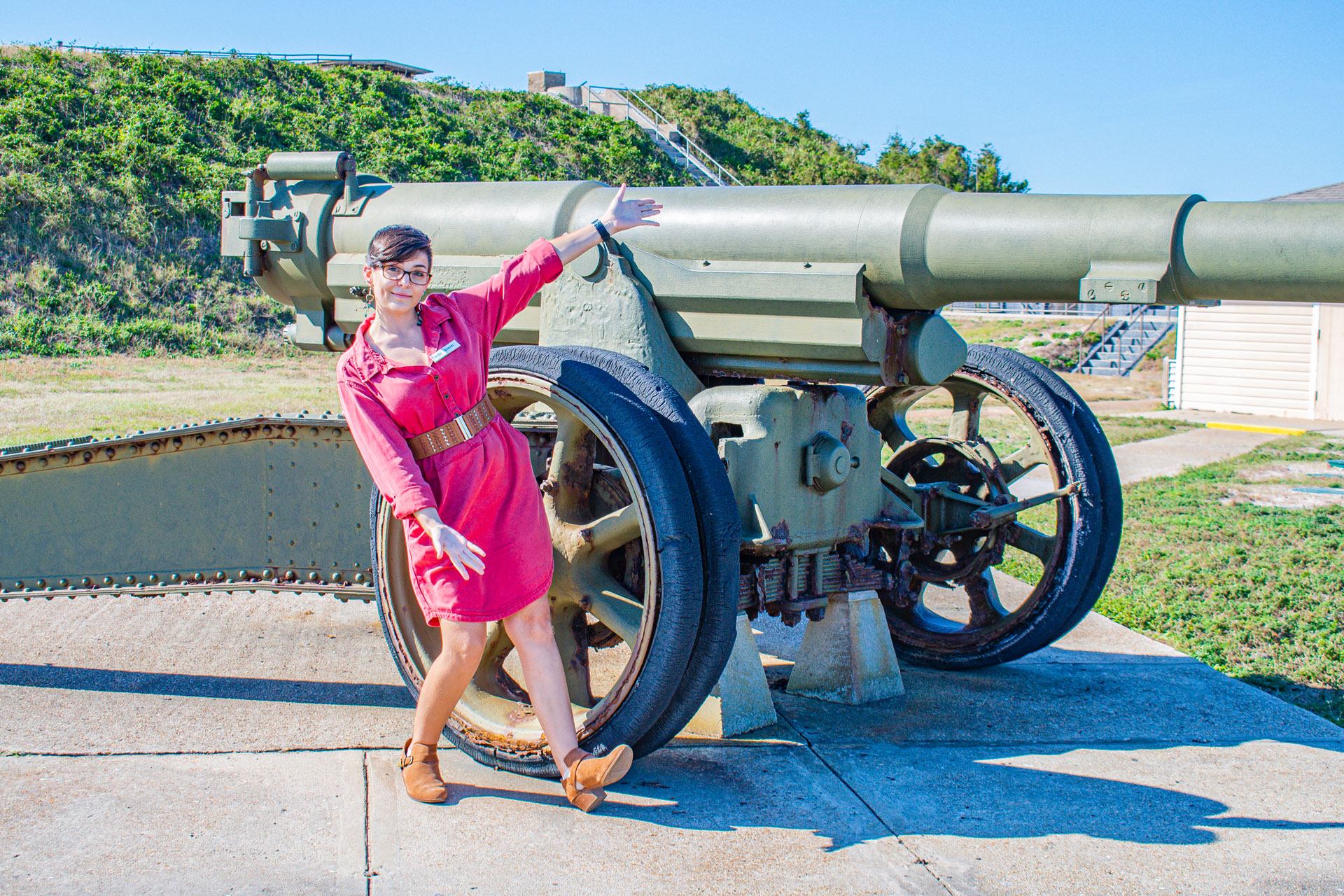 Sarah standing in front of a canon 