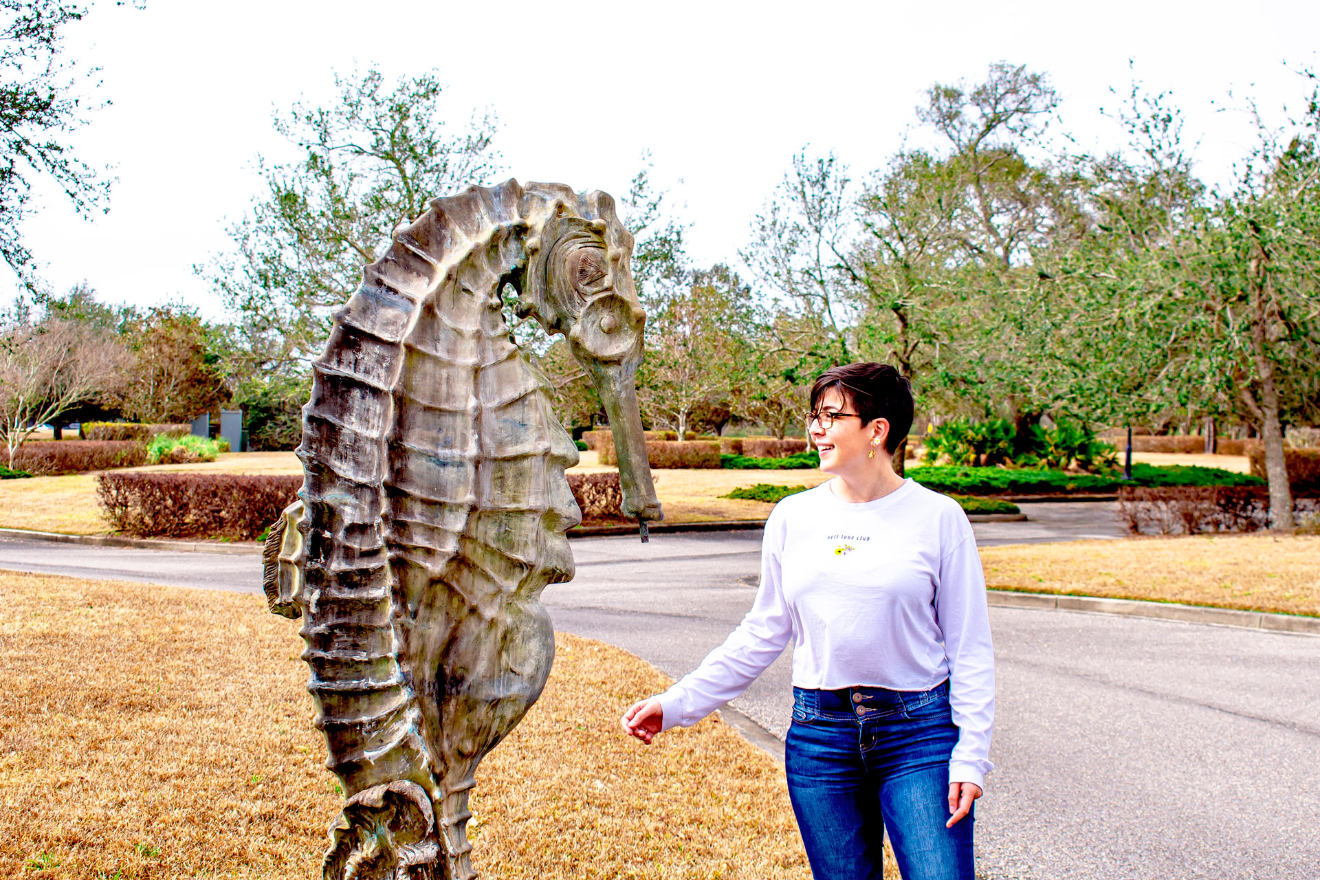 Sarah hanging with a copper seahorse