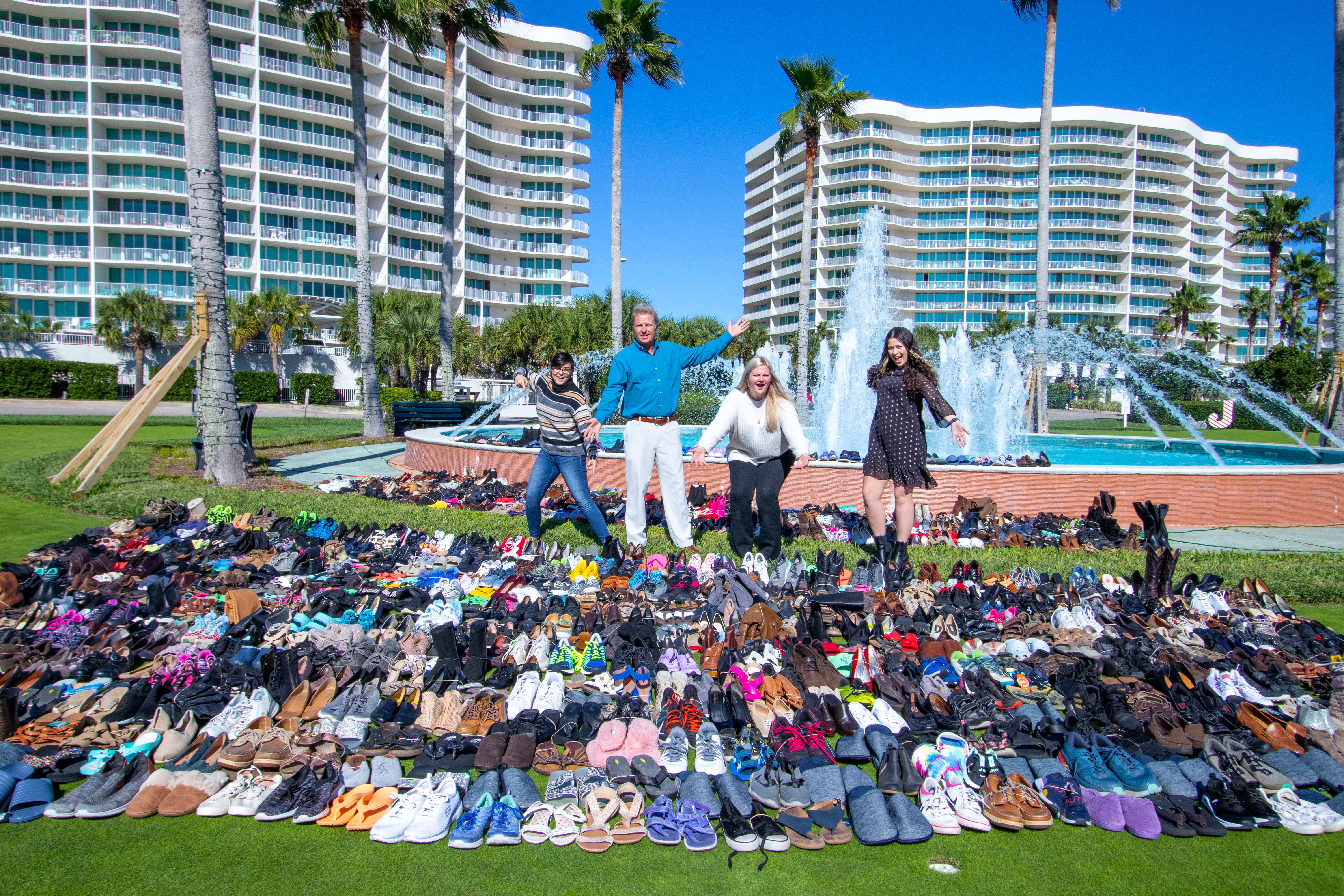 The Caribe team showing shoes